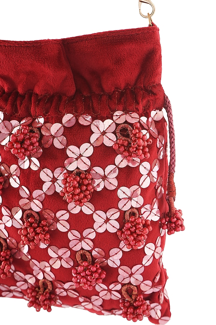 Maroon Suede Sequins Hand Embroidered Potli by A Clutch Story at Pernia's Pop Up Shop