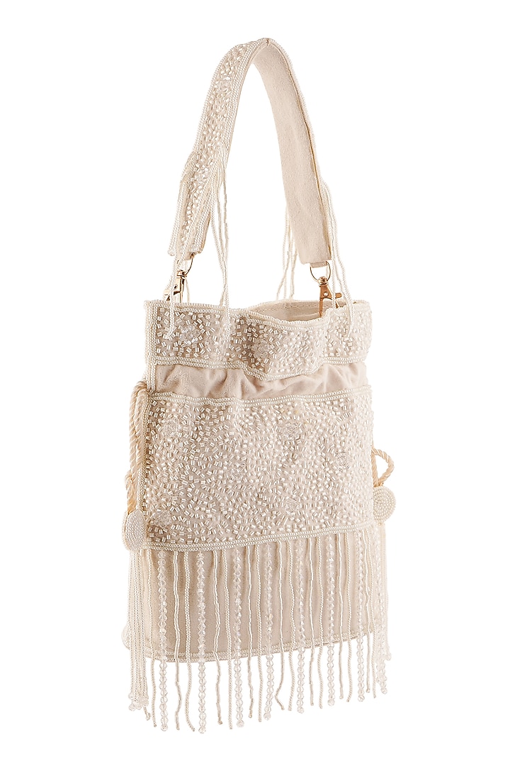 Ivory Suede Beads Hand Embroidered Potli by A Clutch Story at Pernia's Pop Up Shop