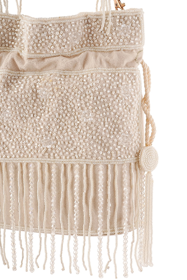 Ivory Suede Beads Hand Embroidered Potli by A Clutch Story at Pernia's Pop Up Shop