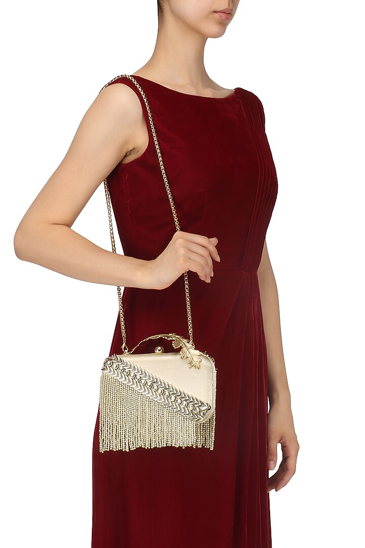 Matt gold metal chain and beads box clutch available only at Pernia's Pop Up Shop.