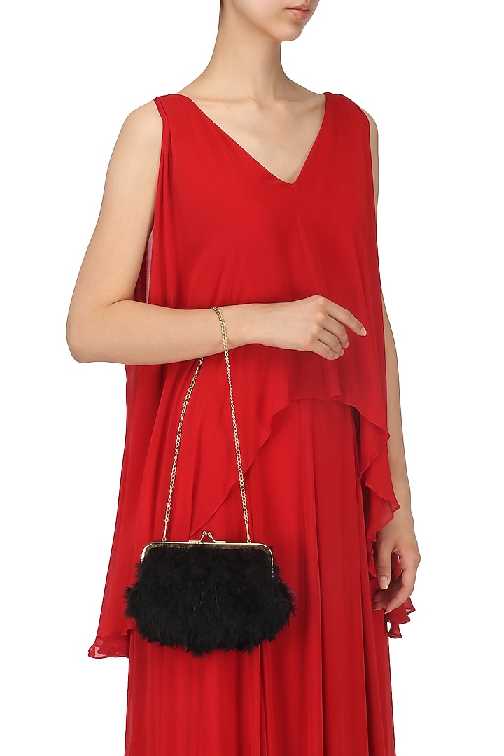 Black soft furr bag/pouch available only at Pernia's Pop Up Shop.