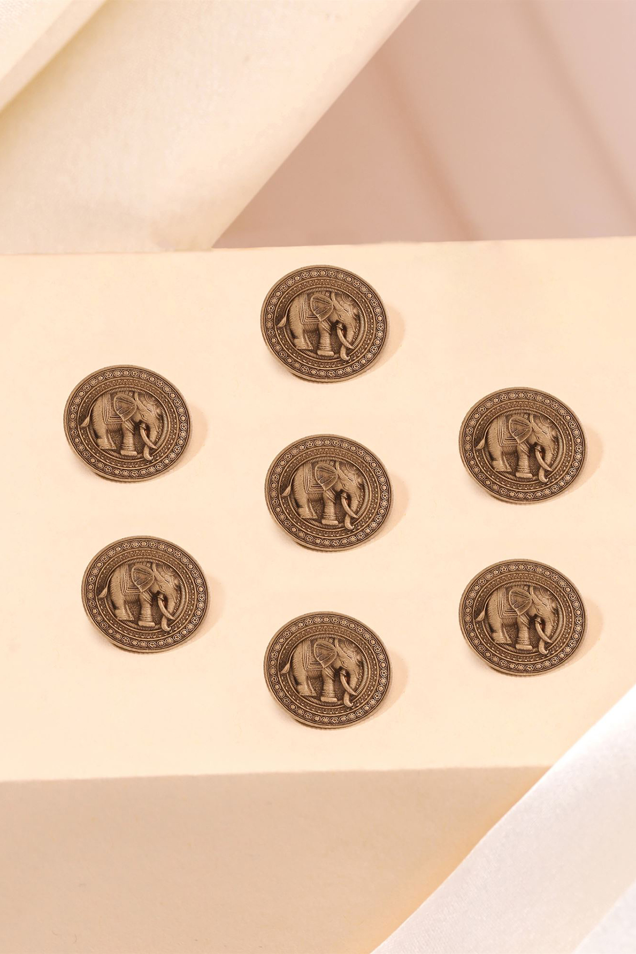 Antique Gold Elephant Majesty Buttons (Set Of 7) by Cosa Nostraa at Pernia's Pop Up Shop