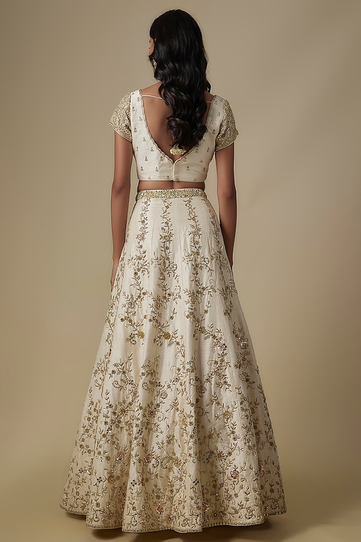 Ivory Raw Silk Floral Embroidered Bridal Lehenga Set by Chamee and Palak at Pernia's Pop Up Shop