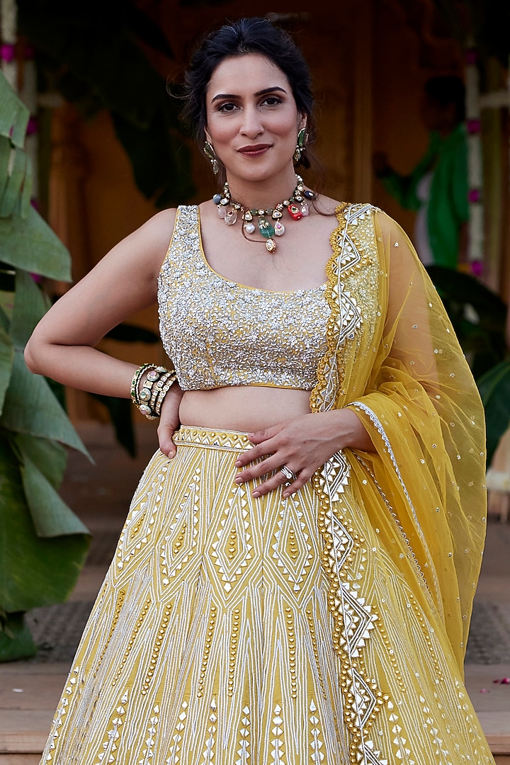 Yellow Dupion Silk Mirror & Applique Embroidered Wedding Lehenga Set by Chamee and Palak at Pernia's Pop Up Shop