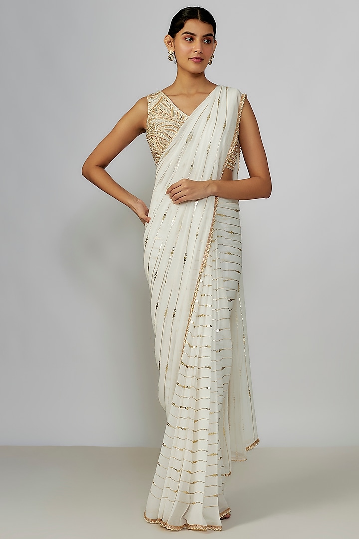 Ivory Georgette Sequins Embroidered Saree Set by Chamee and Palak at Pernia's Pop Up Shop