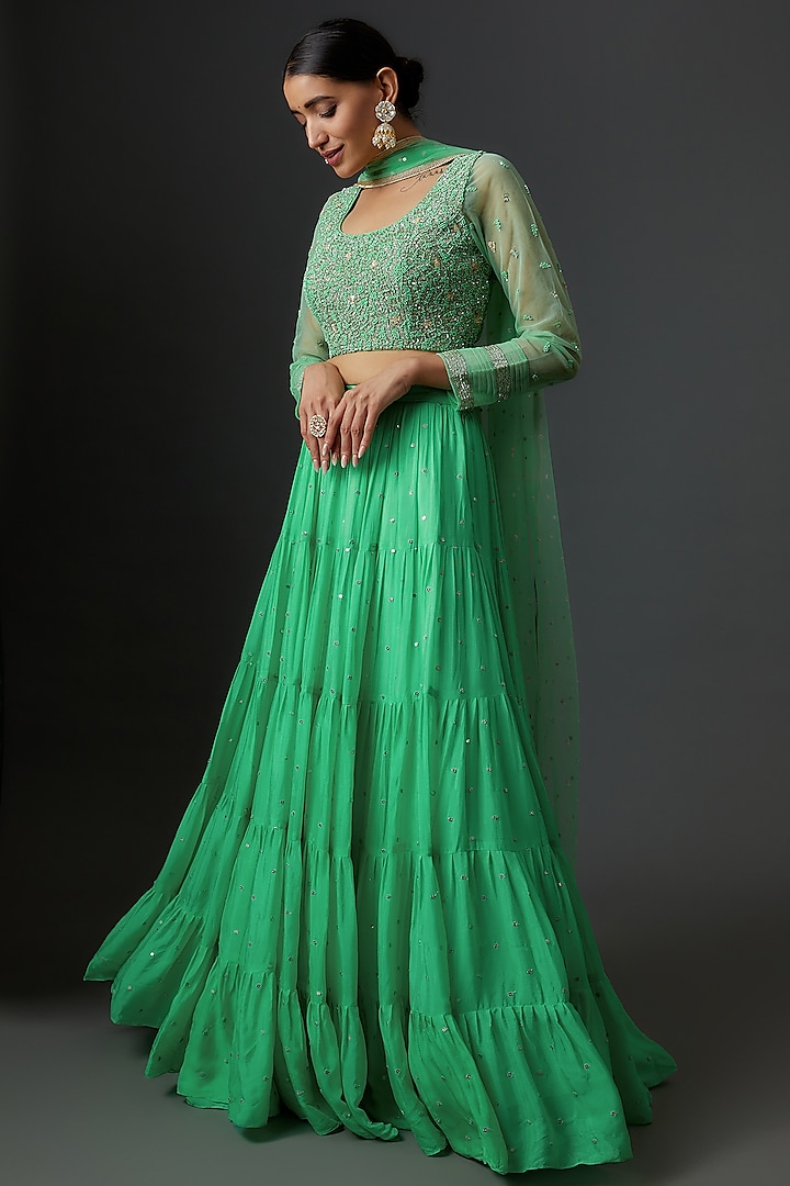 Green Georgette Embroidered Tiered Lehenga Set by Chamee and Palak