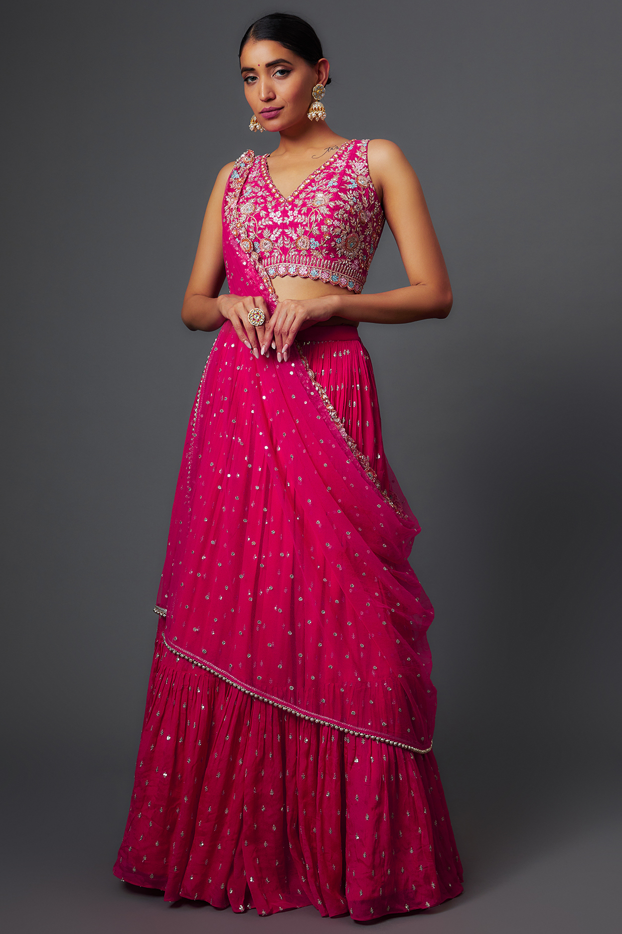 Pink Georgette Embroidered Tiered Lehenga Set by Chamee and Palak