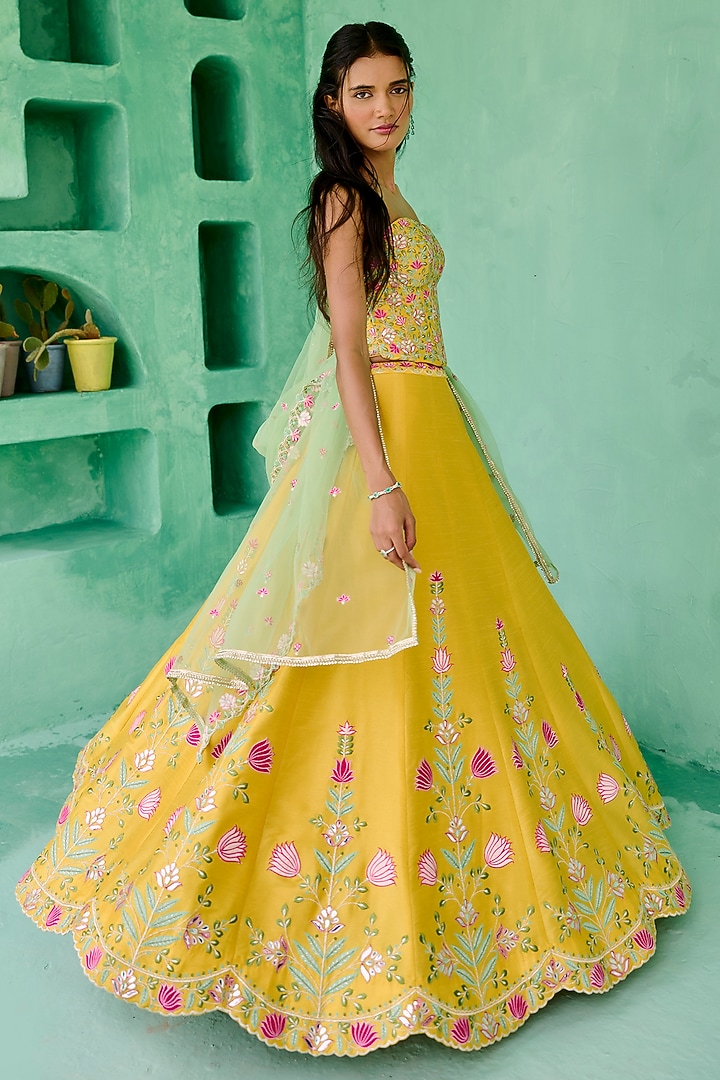 Yellow Dupion Silk Embroidered Wedding Lehenga Set by Chamee and Palak at Pernia's Pop Up Shop
