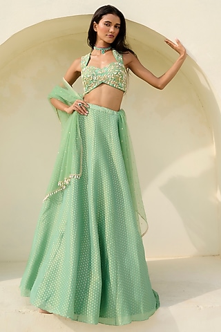Green Tissue Brocade Woven Lehenga Set by Chamee and Palak