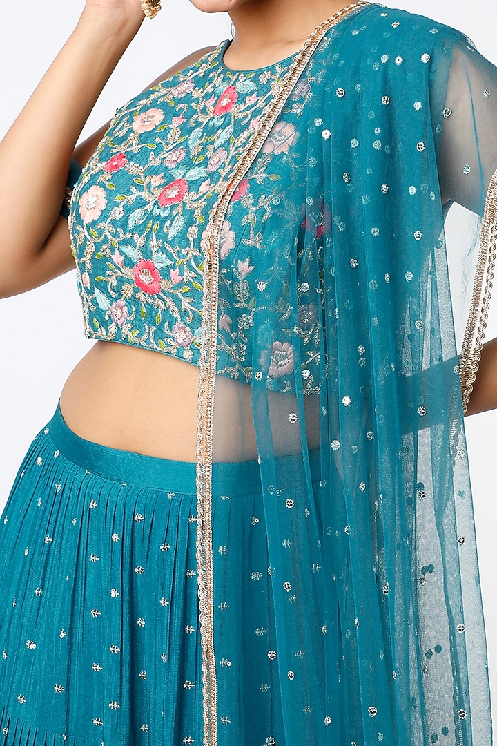 Cadet Blue Tiered Embroidered Wedding Lehenga Set by Chamee and Palak at Pernia's Pop Up Shop