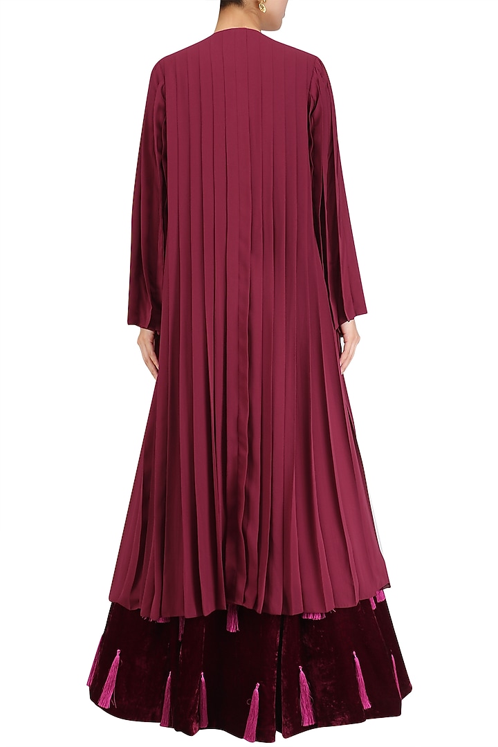Burgundy tasseled lehenga with flared blouse and jacket set available only at Pernia's Pop Up Shop.