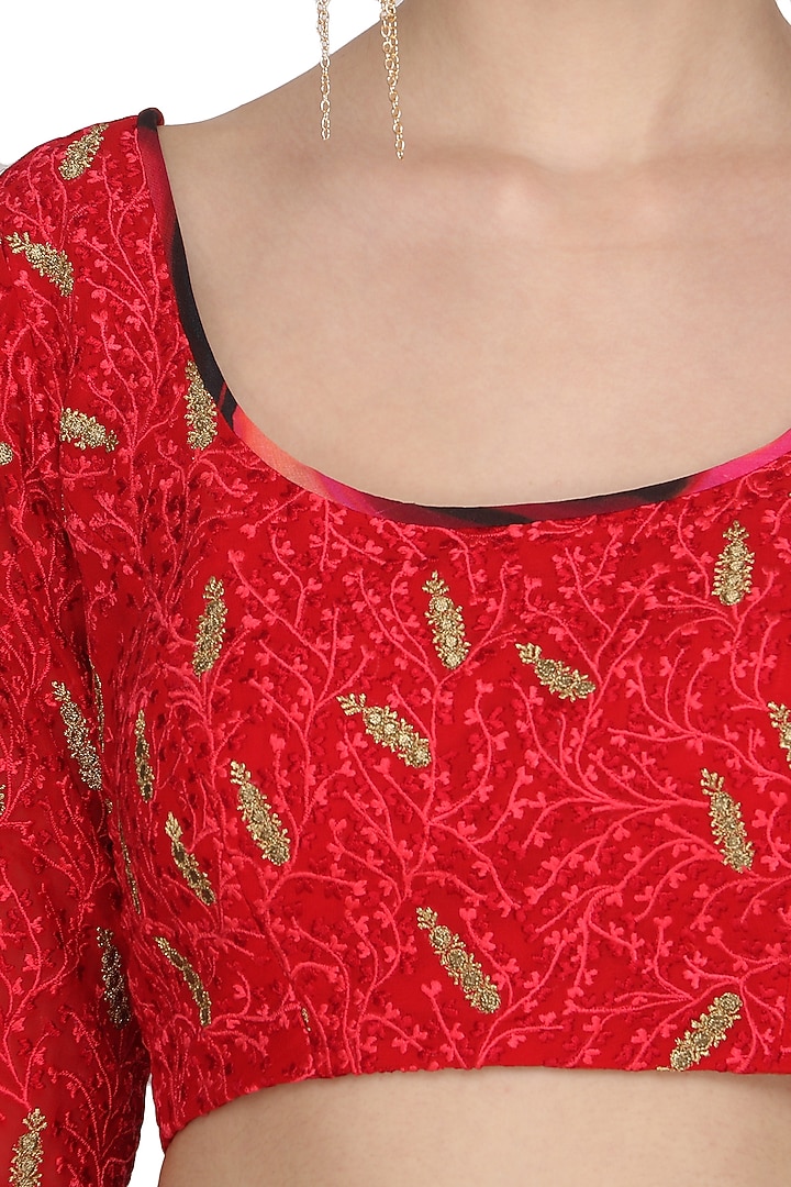 Rose red embroidered blouse with printed lehenga skirt available only at Pernia's Pop Up Shop.