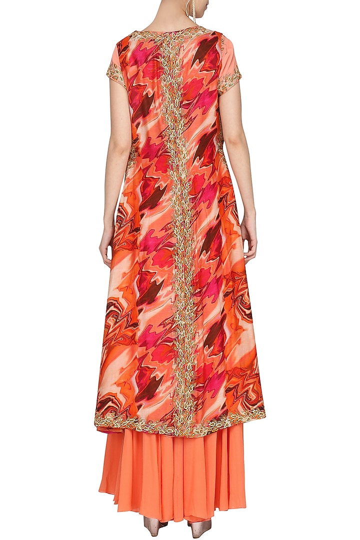 Burnt peach embroidered blouse and sharara pants with printed jacket available only at Pernia's Pop Up Shop.