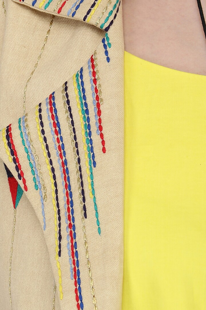 Yellow pleated maxi with beige embroidered jacket available only at Pernia's Pop Up Shop.