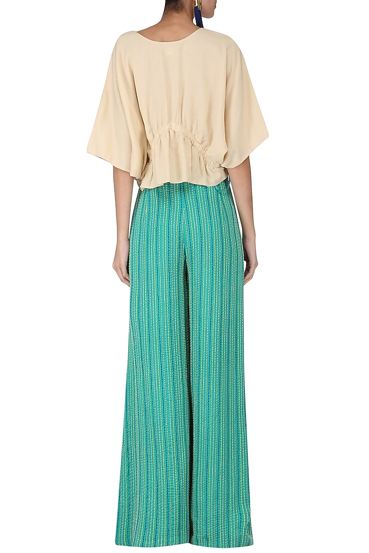 Sand brown ruched top with embroidered palazzo pants available only at Pernia's Pop Up Shop.