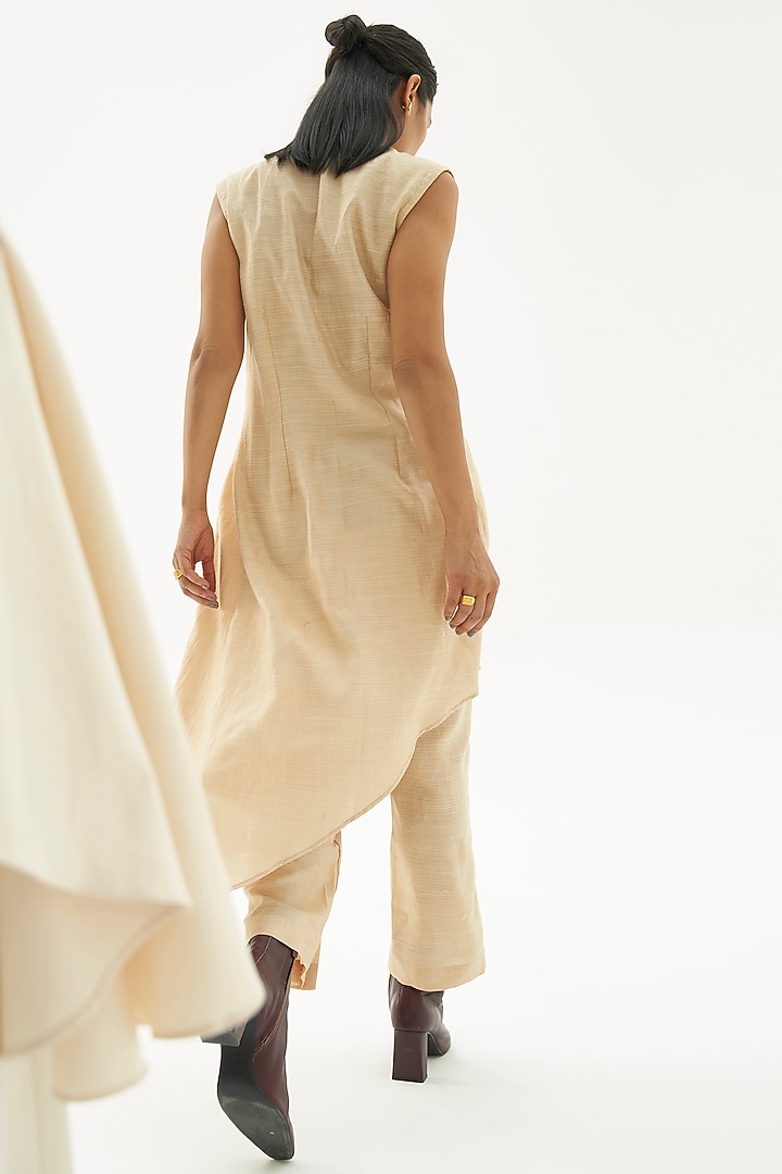 Beige Asymmetrical Co-Ord Set by Corpora Studio at Pernia's Pop Up Shop