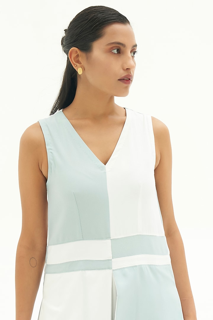 White & Powder Blue Color Blocked Jumpsuit by Corpora Studio at Pernia's Pop Up Shop