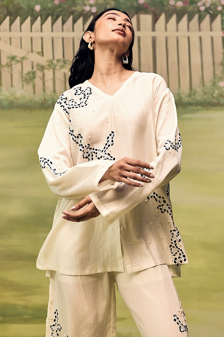 Cream Mulmul Chanderi Machine Embroidered Floral Printed Co-Ord Set by Couche at Pernia's Pop Up Shop