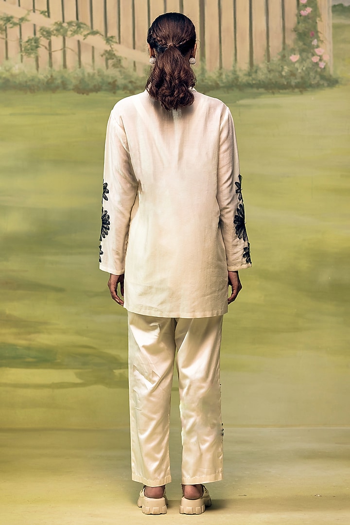Cream & Black Mulmul Chanderi Floral Applique Co-Ord Set by Couche at Pernia's Pop Up Shop