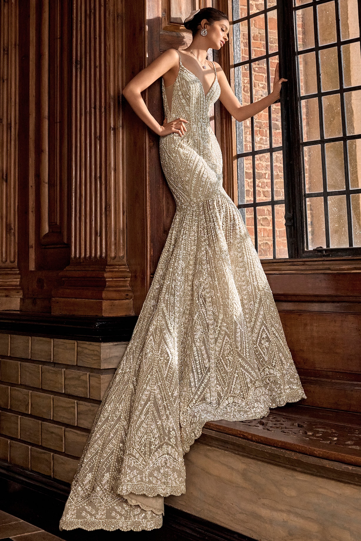 Champagne Net Sequins & Pearl Embroidered Trail Gown by Seema 