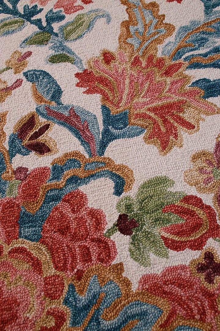 Ivory Hand-Tufted Rug With Multi-Colored Floral Motifs by The blue knot at Pernia's Pop Up Shop
