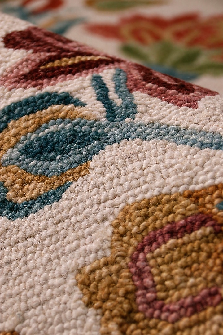Ivory Hand-Tufted Rug With Multi-Colored Floral Motifs by The blue knot at Pernia's Pop Up Shop
