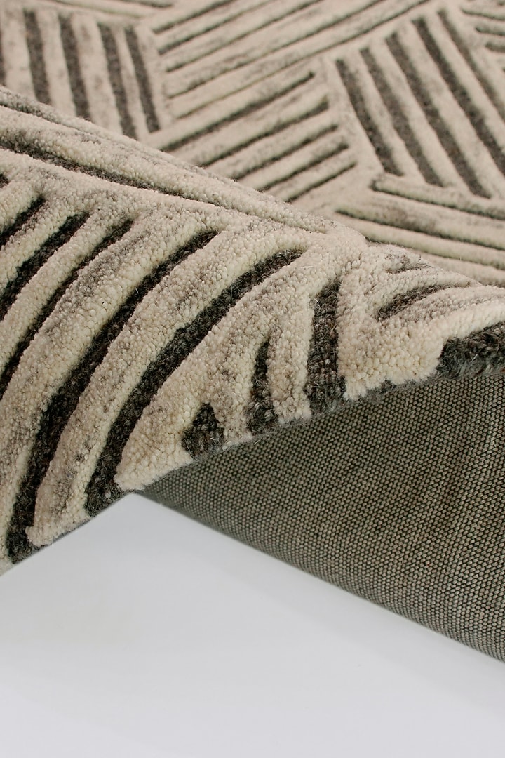 Ivory & Grey Hand-Tufted Rug In Repeated Pattern Of Concentric Lines by The blue knot at Pernia's Pop Up Shop