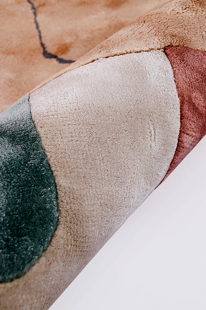 Ivory Hand-Tufted Rug With Multi-Colored Patterns by The blue knot at Pernia's Pop Up Shop