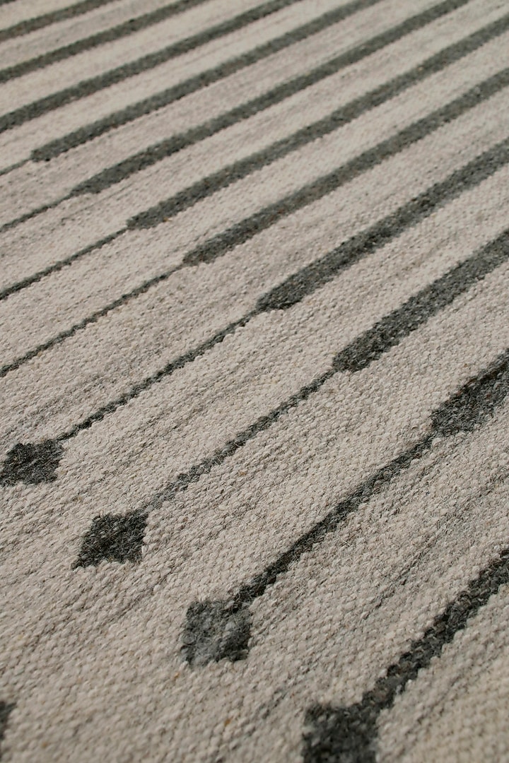 Grey Handwoven Rug In Wool by The blue knot at Pernia's Pop Up Shop