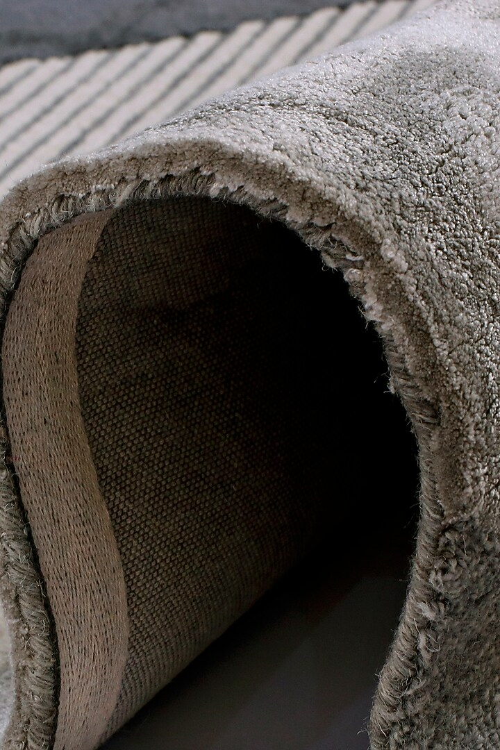 Ivory Hand-Tufted Rug In Wool & Viscose by The blue knot at Pernia's Pop Up Shop