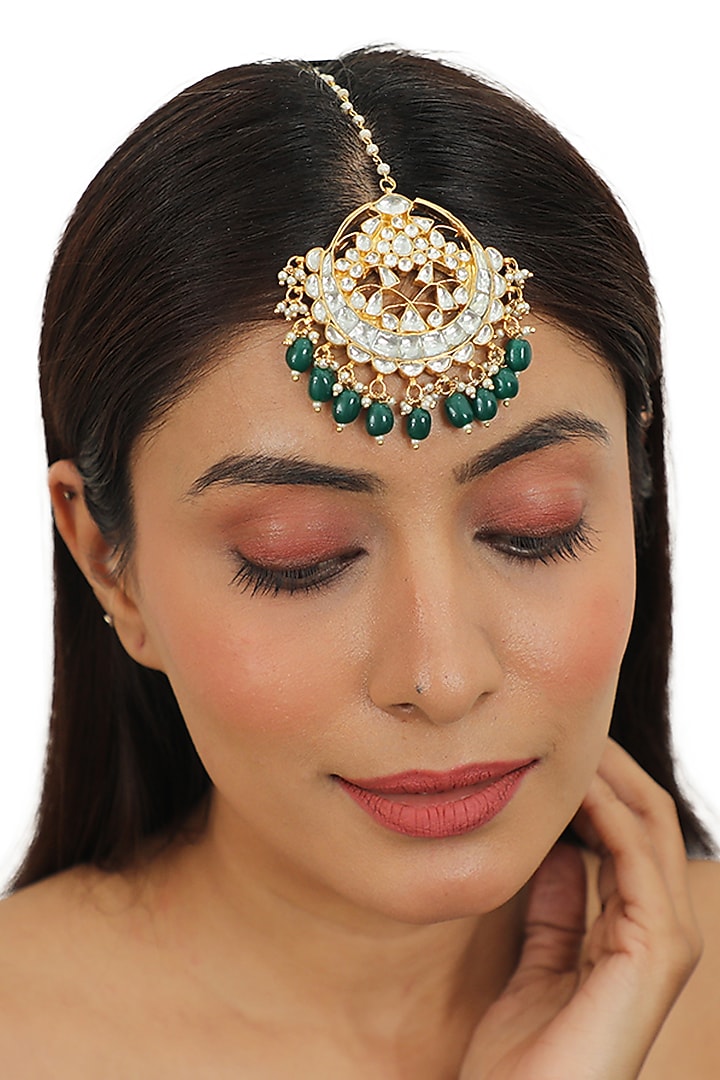 Gold Finish Maang Tikka With Emerald Beads by Riana Jewellery at Pernia's Pop Up Shop