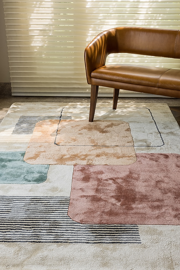 Ivory Hand-Tufted Rug With Multi-Colored Patterns by The blue knot at Pernia's Pop Up Shop