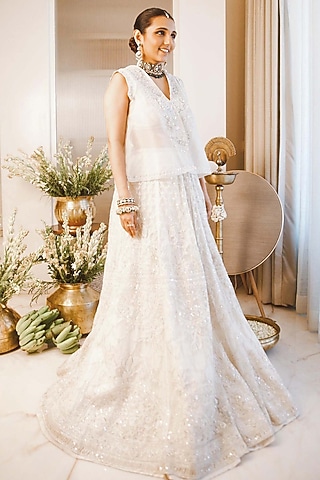 Ivory Net Thread Embroidered Jacket Lehenga Set by Ridhi Mehra