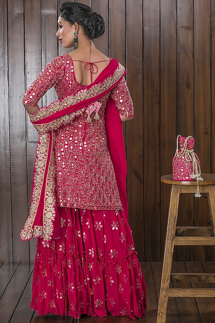 Pink Hand Embellished Bridal Sharara Set With Potli by CHARU PARASHAR at Pernia's Pop Up Shop