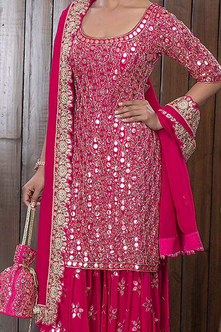 Pink Hand Embellished Bridal Sharara Set With Potli by CHARU PARASHAR at Pernia's Pop Up Shop