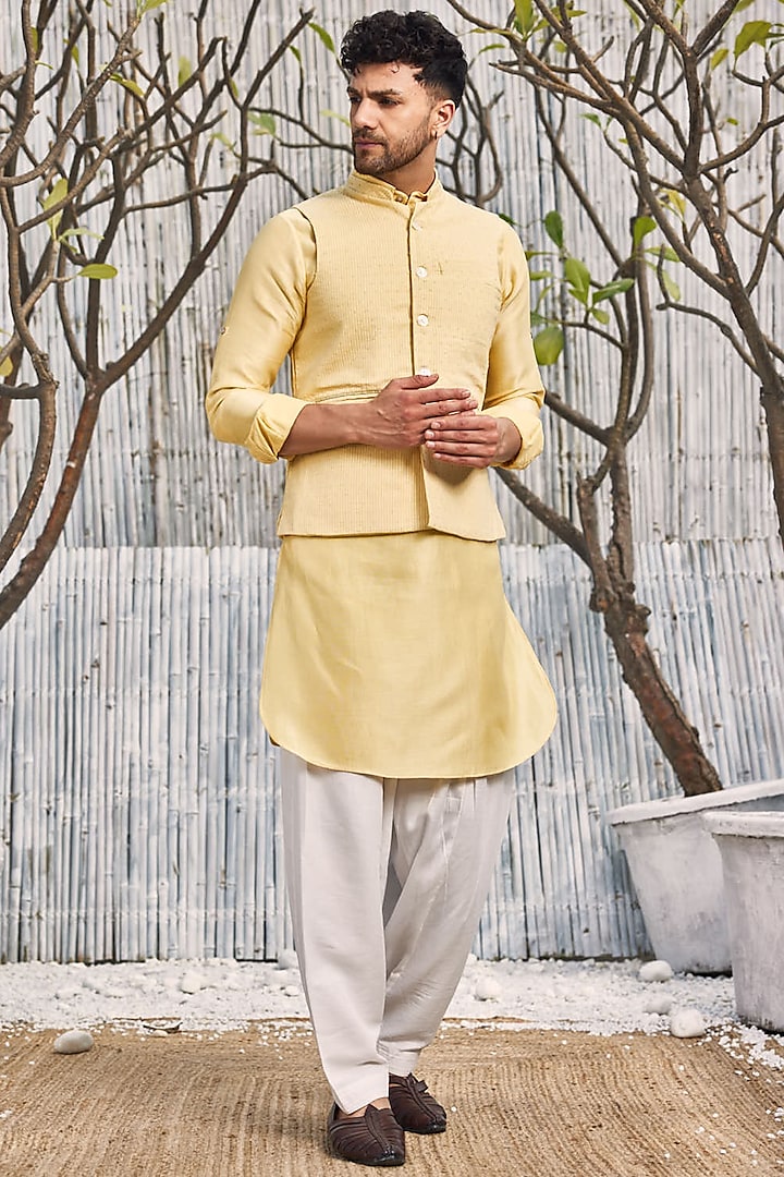Pastel Yellow Dobby Cotton Bundi Jacket With Kurta Set by Charkhee Men