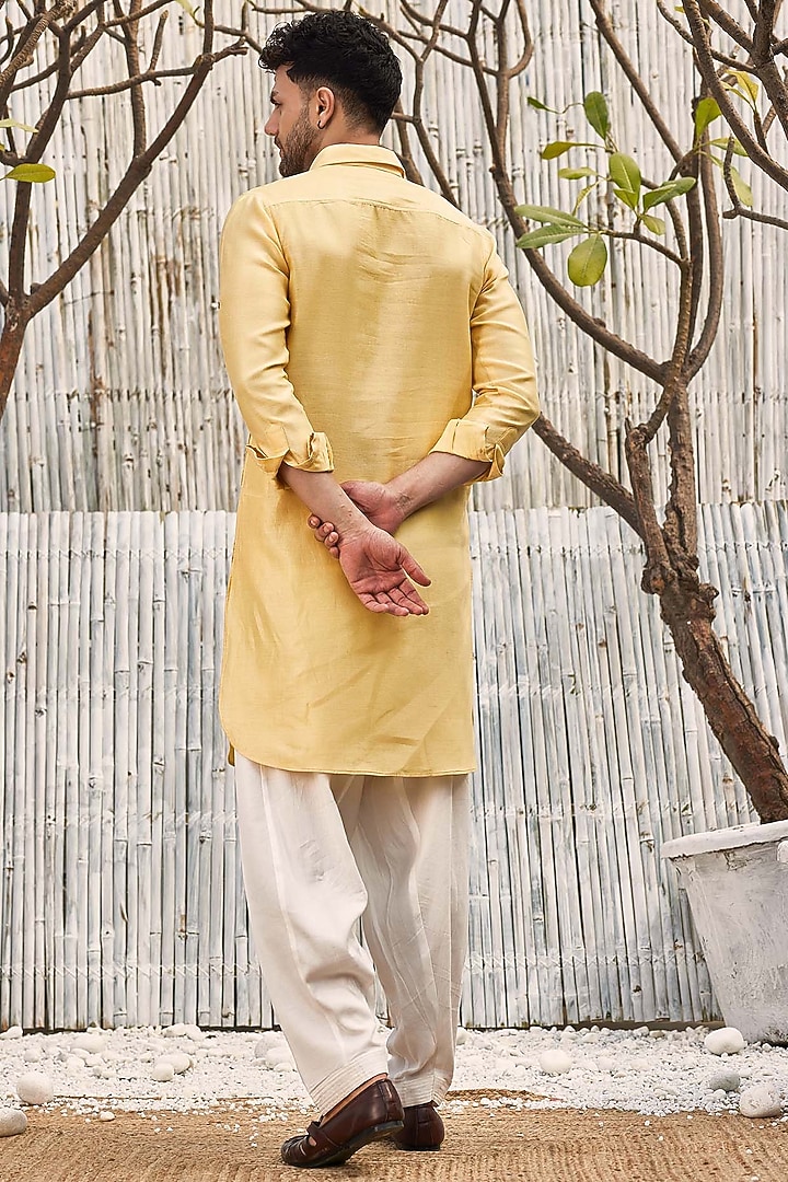 Pastel Yellow Dobby Cotton Bundi Jacket With Kurta Set by Charkhee Men at Pernia's Pop Up Shop