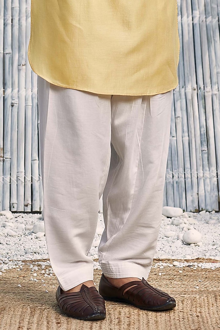 Pastel Yellow Dobby Cotton Bundi Jacket With Kurta Set by Charkhee Men at Pernia's Pop Up Shop