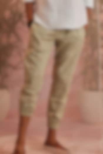 Olive Green Textured Cotton Joggers by Charkhee Men at Pernia's Pop Up Shop