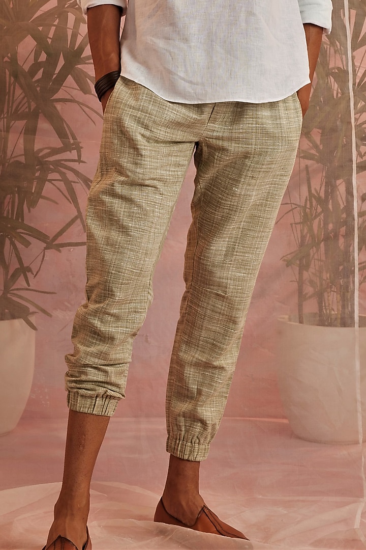 Olive Green Textured Cotton Joggers by Charkhee Men at Pernia's Pop Up Shop