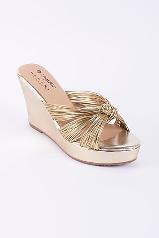 Gold Faux Leather Wedges by Crimzon X Hemant Trevedi