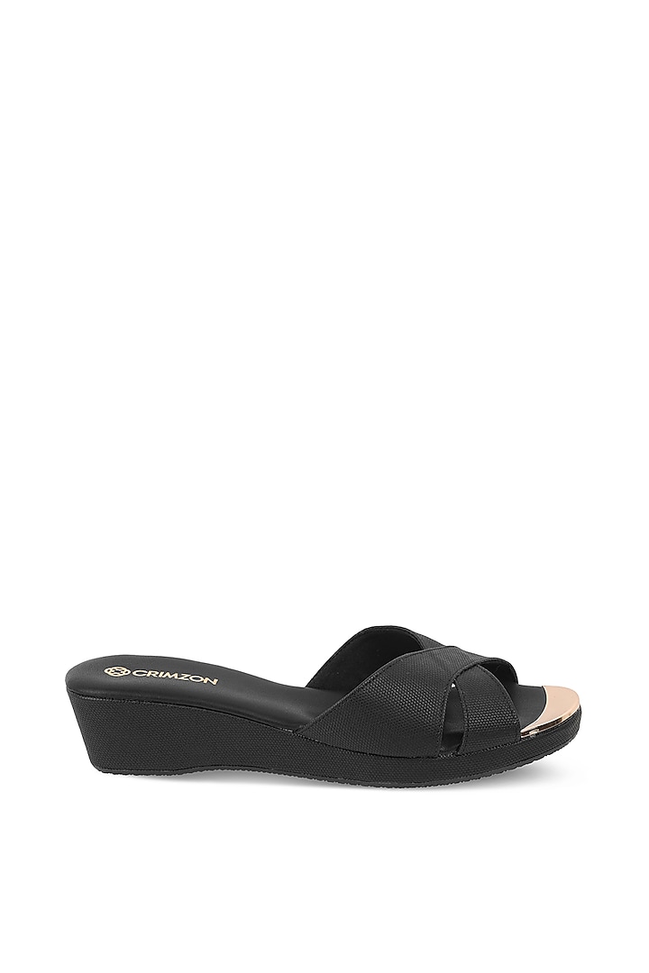 Black Faux Leather Embellished Slip-On Wedges by Crimzon at Pernia's Pop Up Shop
