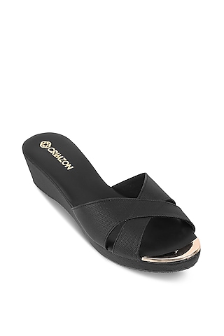 Black Faux Leather Embellished Slip-On Wedges by Crimzon