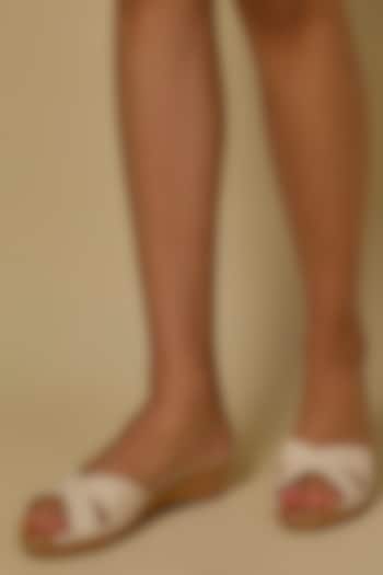 Ivory Synthetic Leather Slip-On Wedges by Crimzon at Pernia's Pop Up Shop
