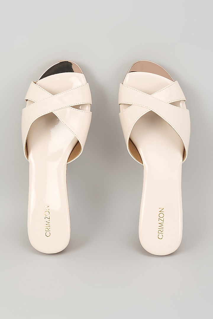 Ivory Synthetic Leather Slip-On Wedges by Crimzon at Pernia's Pop Up Shop