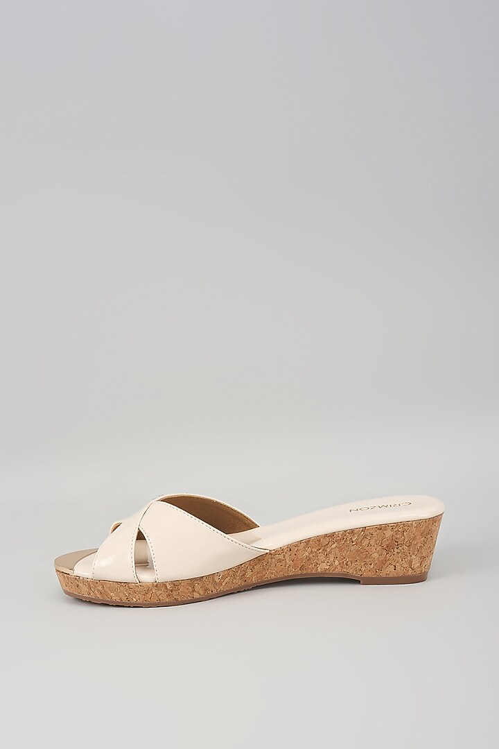 Ivory Synthetic Leather Slip-On Wedges by Crimzon at Pernia's Pop Up Shop