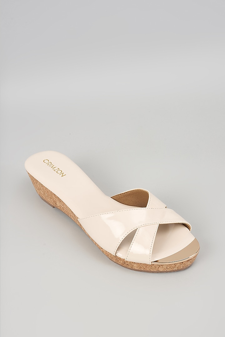 Ivory Synthetic Leather Slip-On Wedges by Crimzon at Pernia's Pop Up Shop