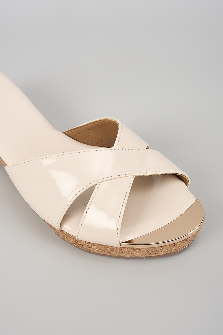 Ivory Synthetic Leather Slip-On Wedges by Crimzon at Pernia's Pop Up Shop