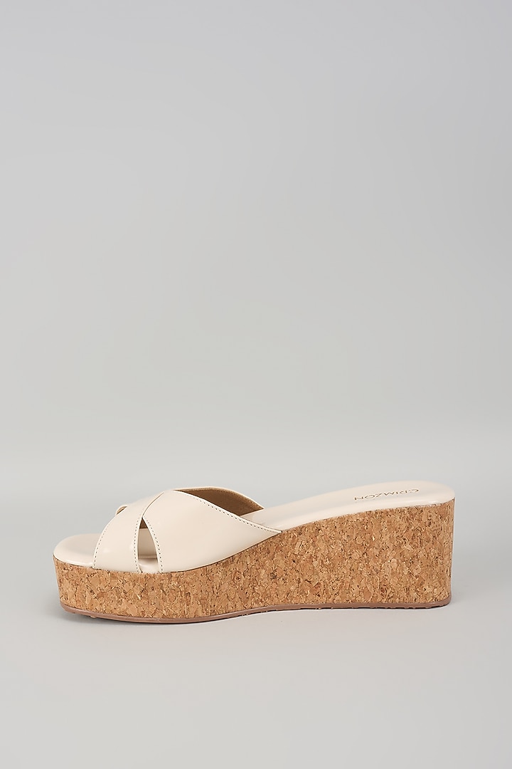 Ivory Synthetic Leather Wedges by Crimzon at Pernia's Pop Up Shop