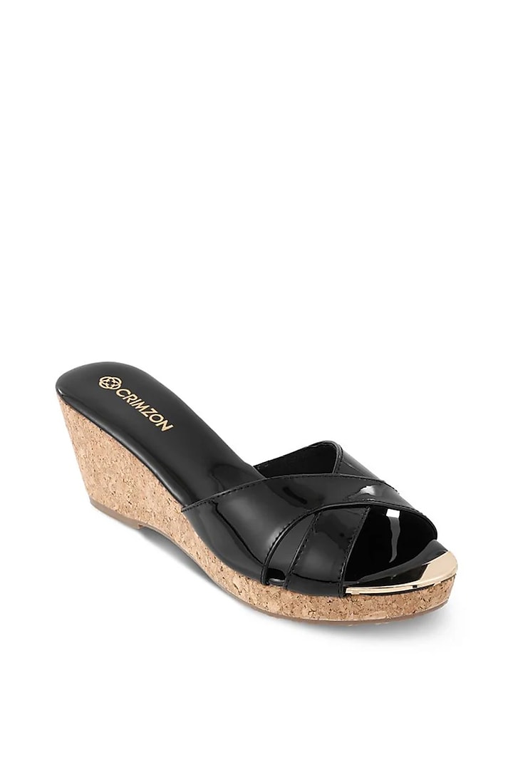 Black Faux Leather Embellished Slip-On Wedges by Crimzon at Pernia's Pop Up Shop